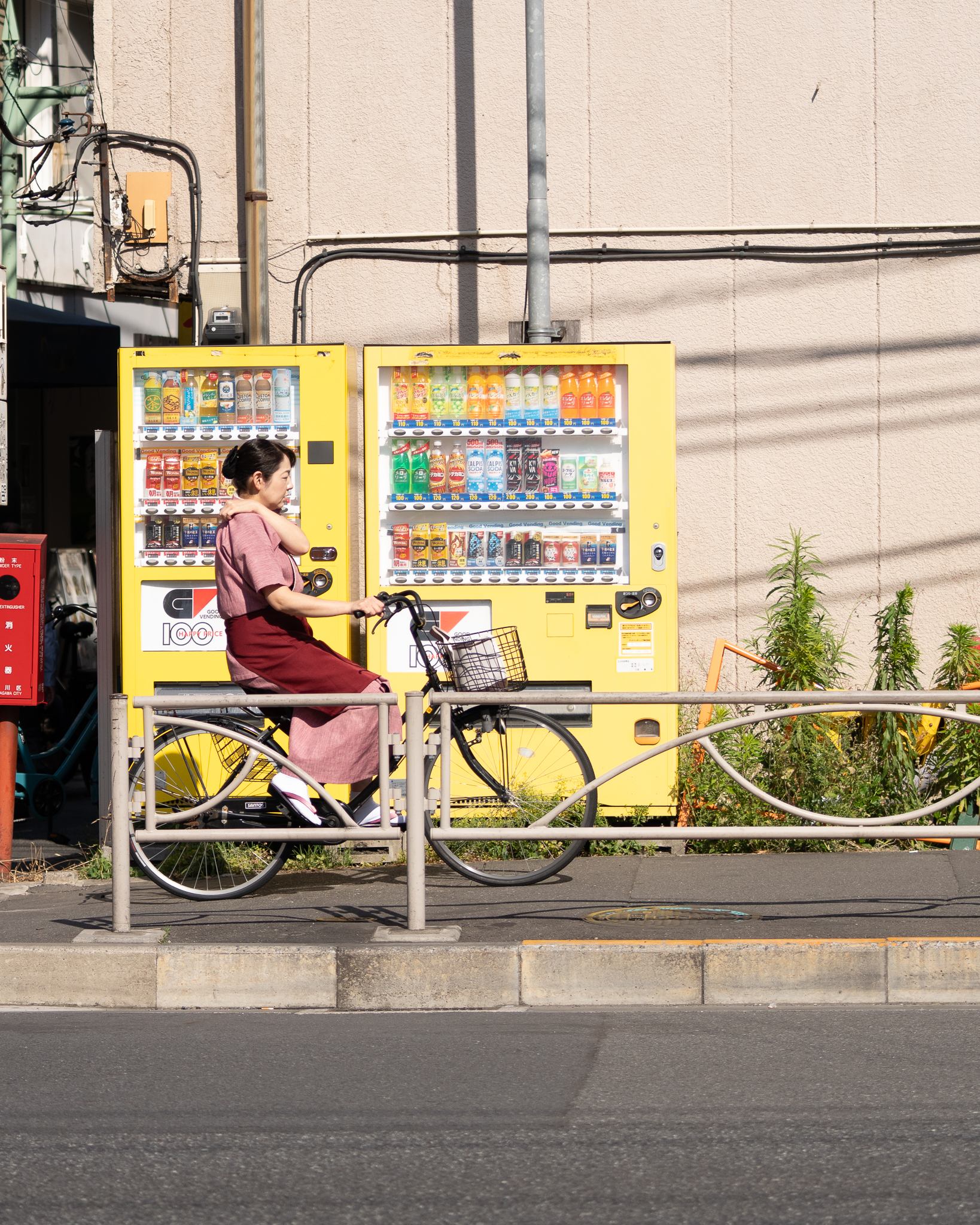 Candid street photograph, frame 6 of 14